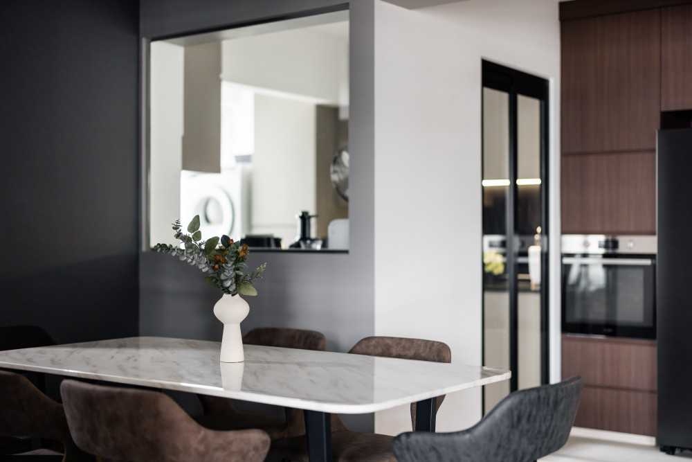 Industrial Dining Room with Glass Door and Dining Table