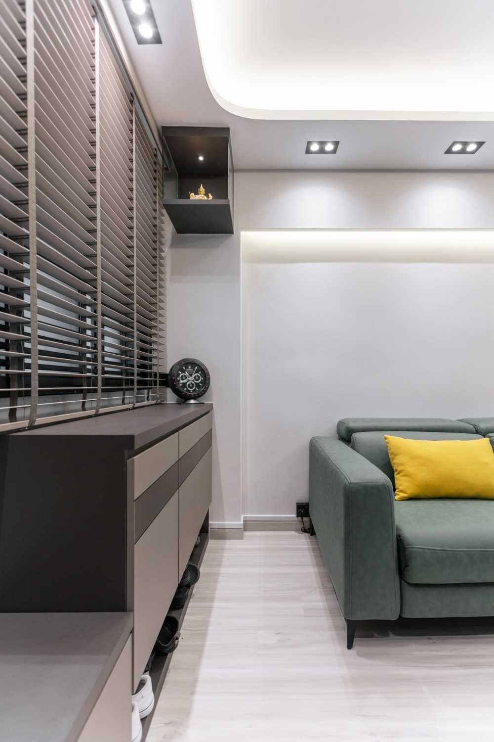 Contemporary Entryway with Cove Lighting and Shoe Rack