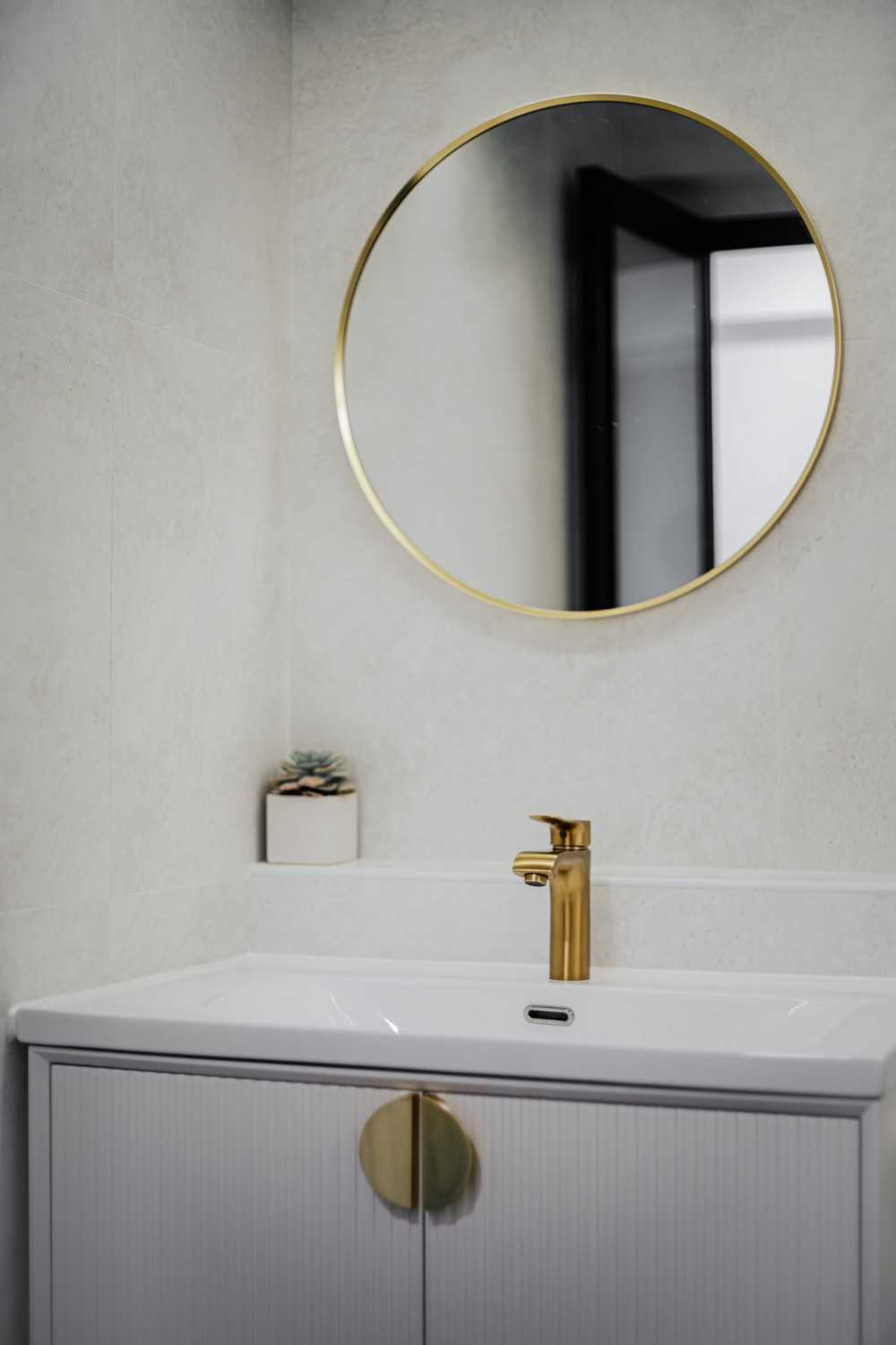 Minimalist Bathroom with Countertop and Mirror