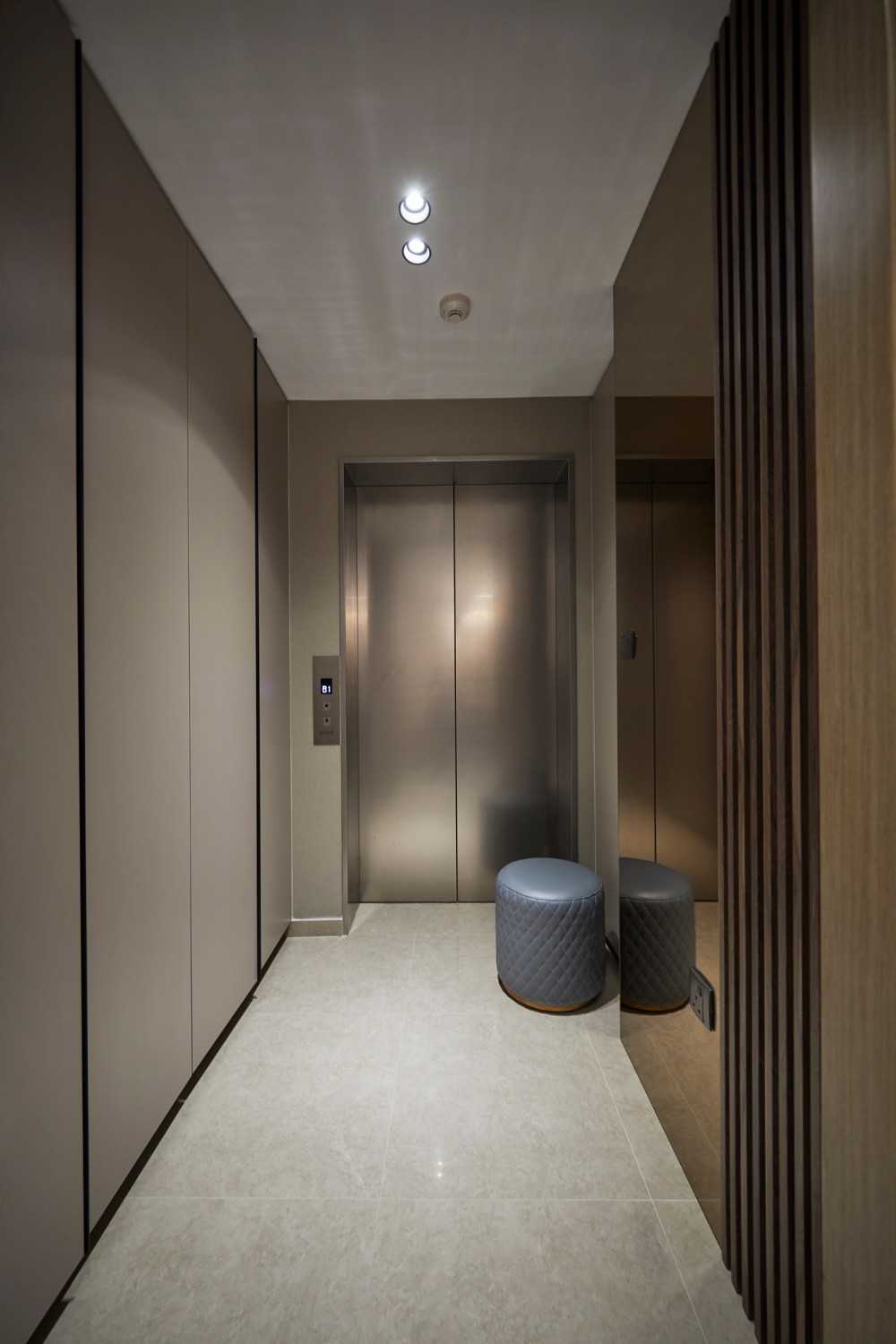 Modern Entryway with Wardrobe and Paintings