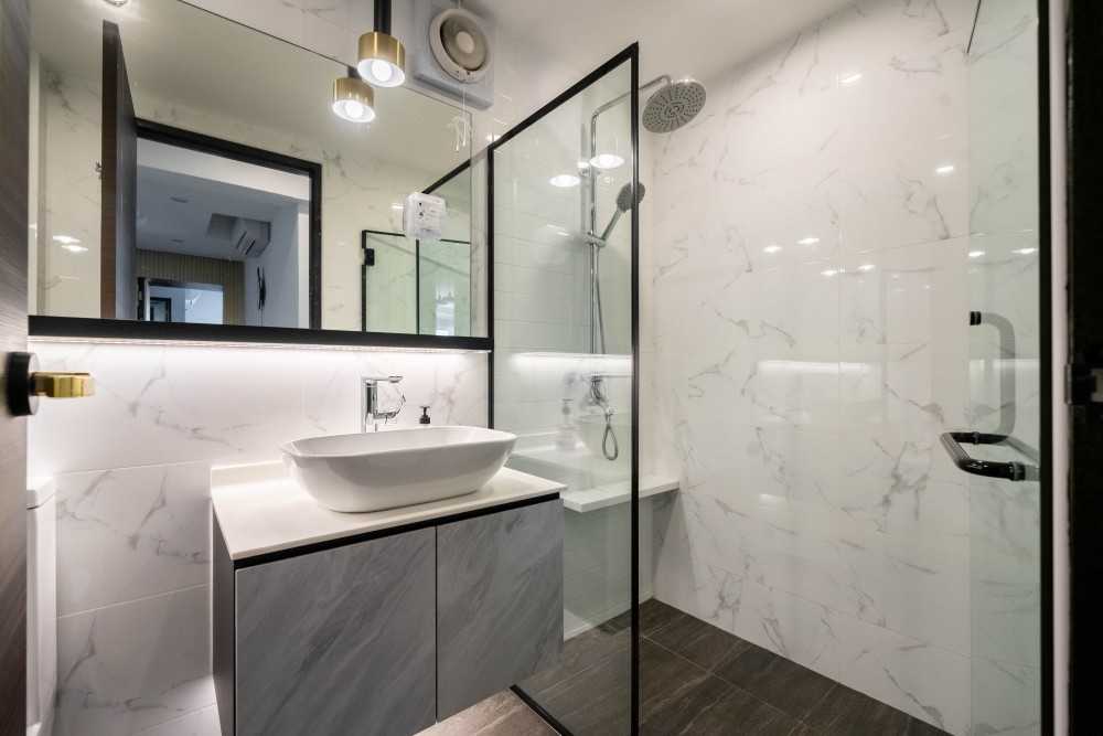 Contemporary Bathroom with Herringbone Tiling and Wood Flooring