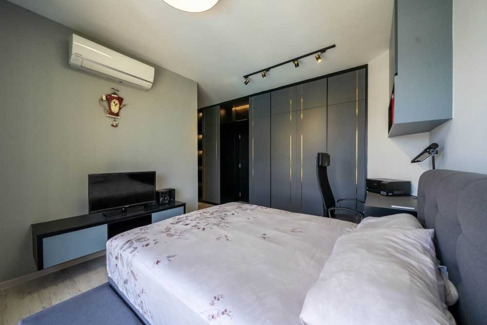 Contemporary Bedroom with Homogeneous Tiles and Built-in Bed