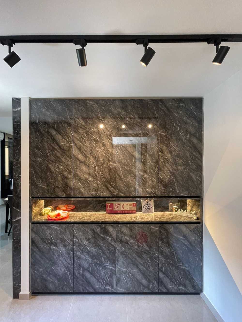 Modern Entryway with Paintings and Storage Cabinets