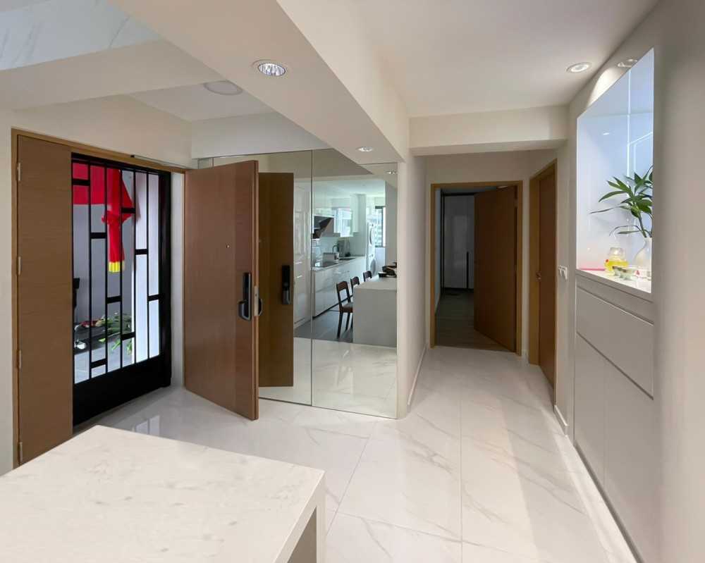 Modern Foyer with Mirror and Paintings