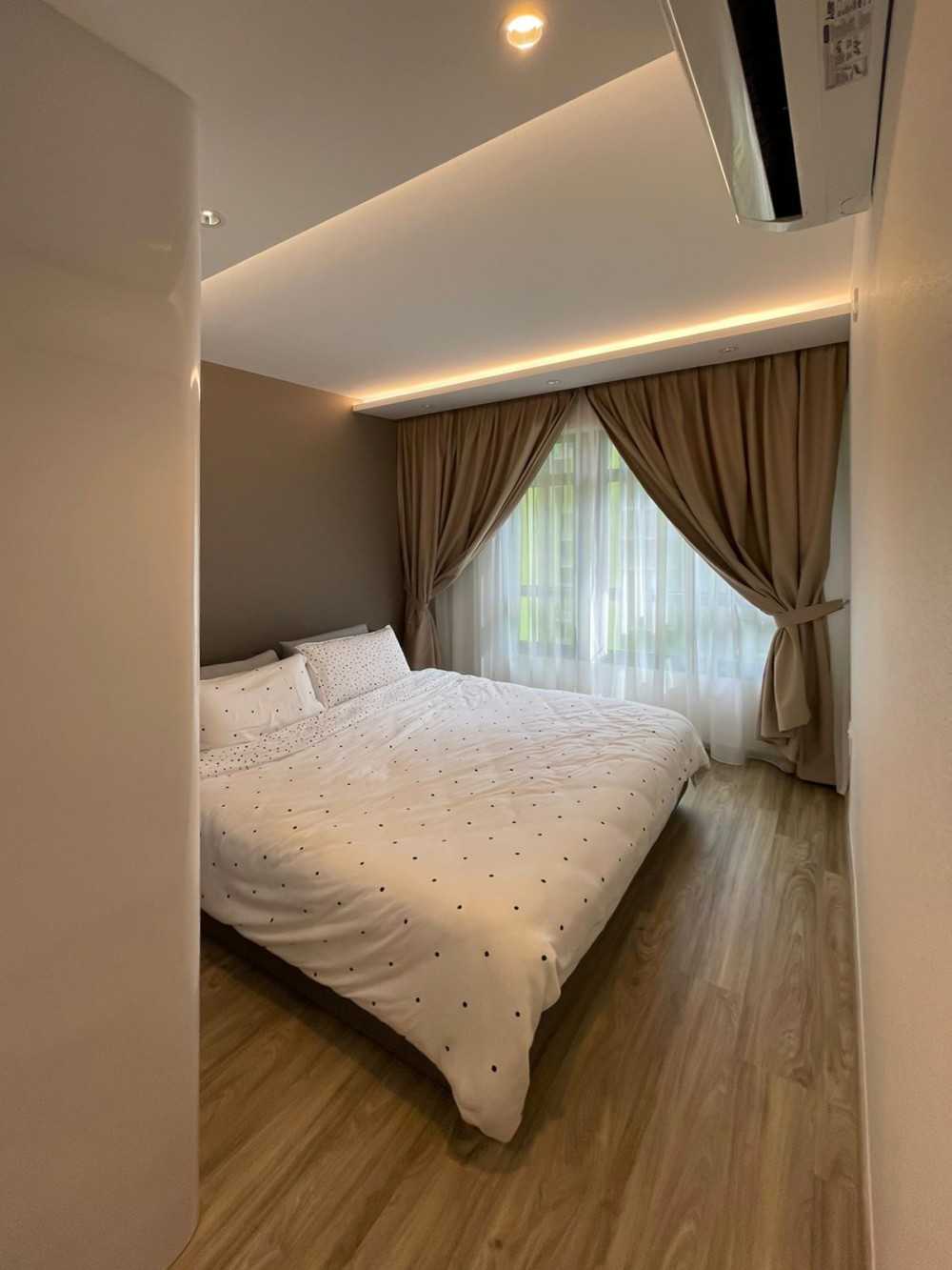 Modern Bedroom with Wood Flooring and Wardrobe