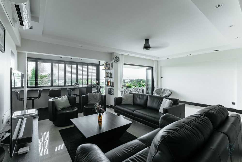 Modern Living Room with Bookshelf and Homogeneous Tiles