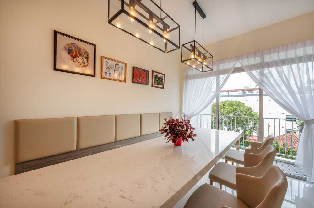 Asian Dining Room with Drop Light and Dining Table