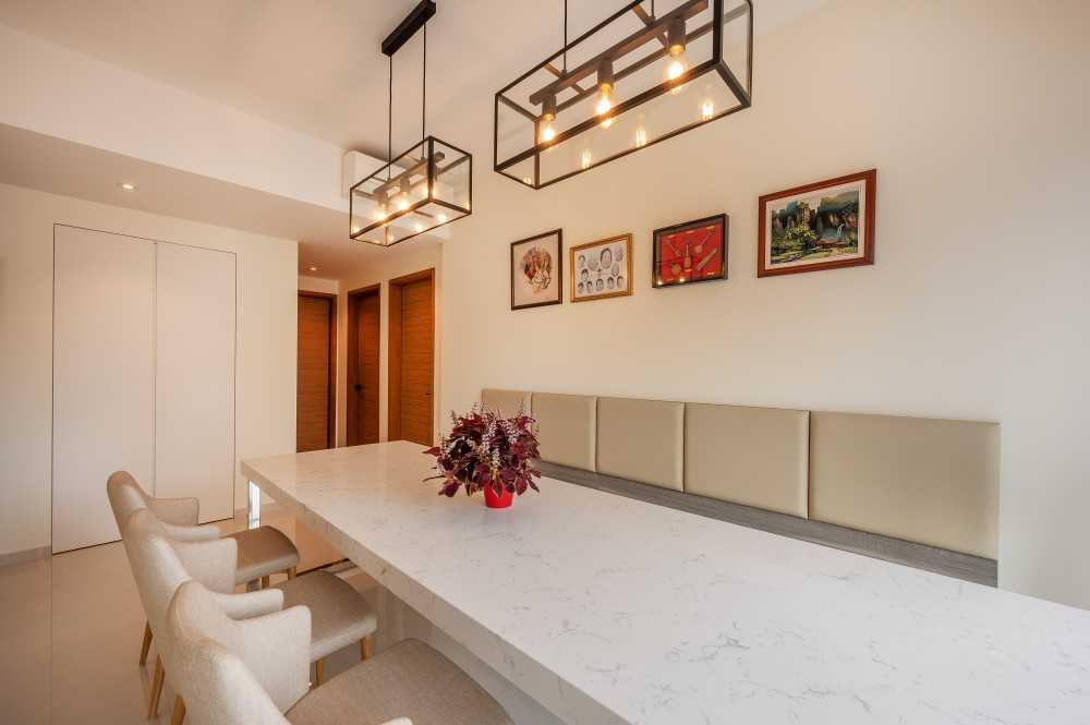 Asian Dining Room with Drop Light and Dining Table