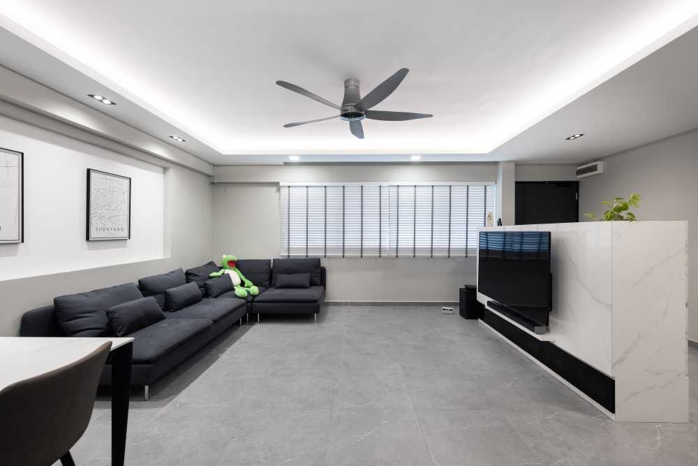 Minimalist Living Room with Feature Wall and Ceiling Fan