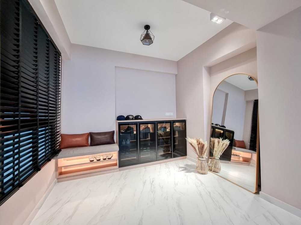 Contemporary Foyer with Artwork and Planters