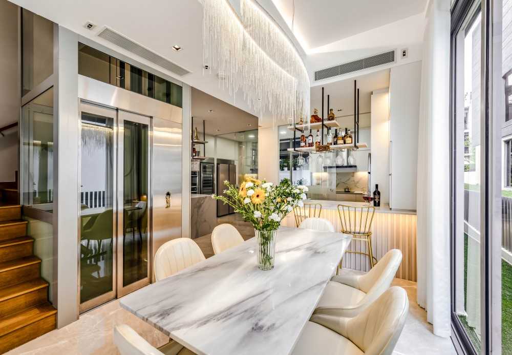 Scandinavian Dining Room with Drop Light and Dining Table
