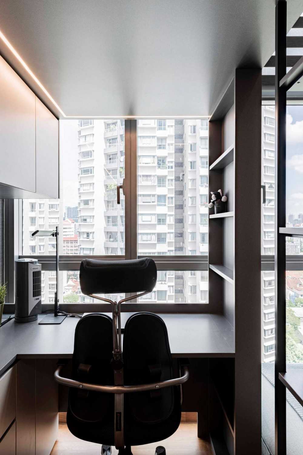 Contemporary Home Office with Wallpaper and Desk Chairs