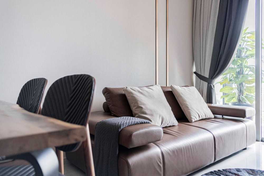 Contemporary Living Room with Herringbone Tiling and Cement Floor
