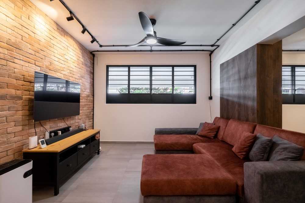 Industrial Living Room with Bookshelf and Drop Ceiling