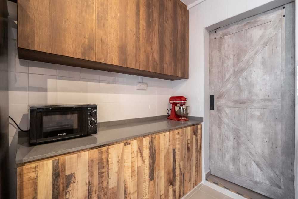 Industrial Kitchen with Vinyl Flooring and Homogeneous Tiles