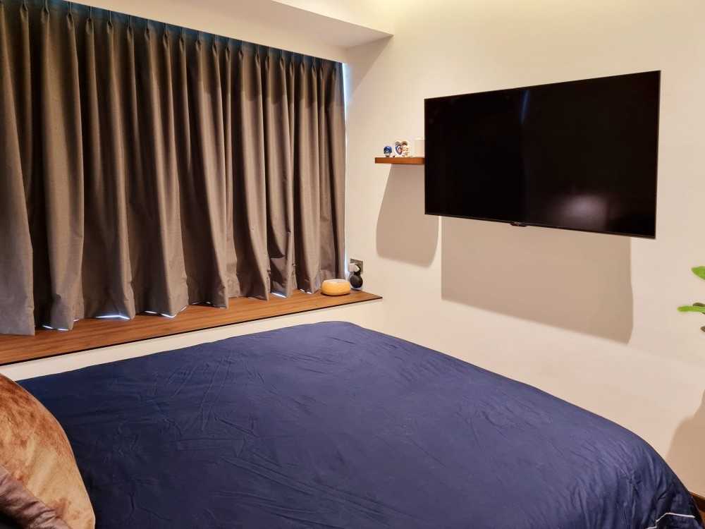 Scandinavian Bedroom with Feature Wall and Window Seat