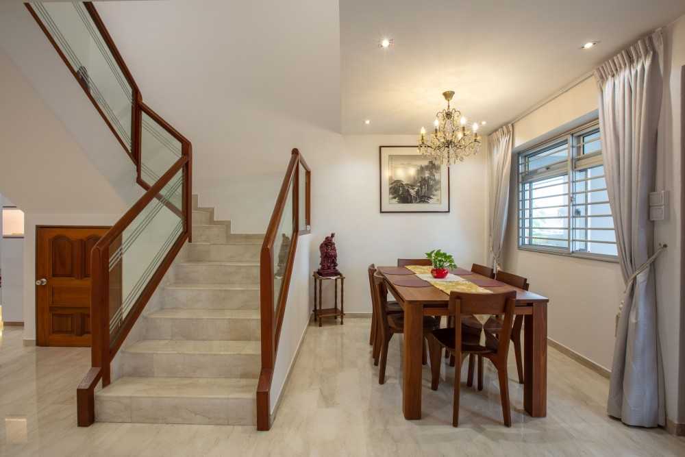 Asian Dining Room with Drop Light and Dining Table