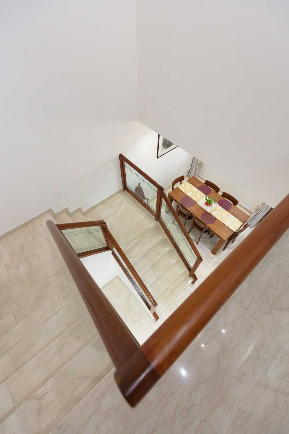 Asian Foyer with Artwork and Coat Rack