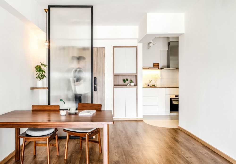 Scandinavian Dining Room with Drop Light and Dining Table