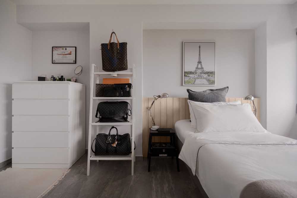 Modern Bedroom with Paintings and Display Cabinets