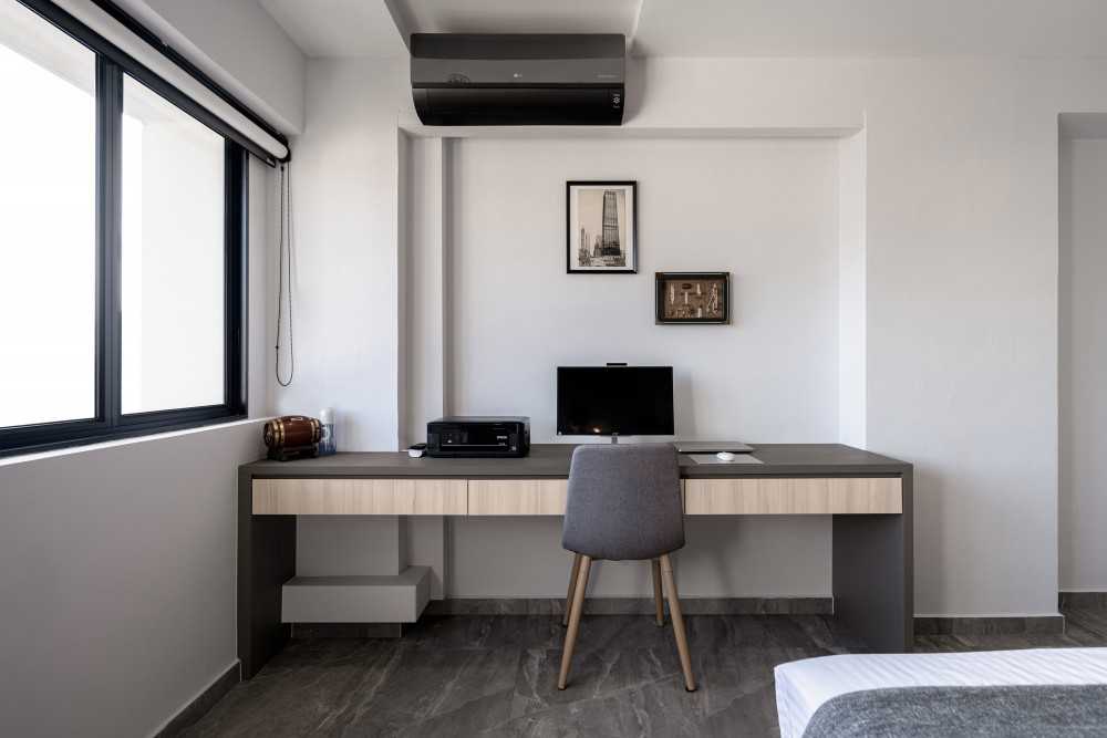 Modern Bedroom with Desk Chairs and Computer