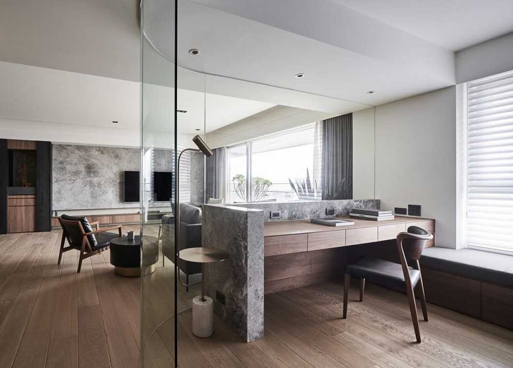 Contemporary Living Room with Bookshelf and Feature Wall