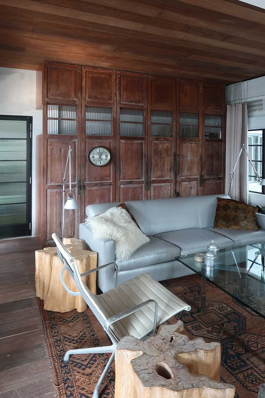 Modern Living Room with Wood Flooring and Feature Wall