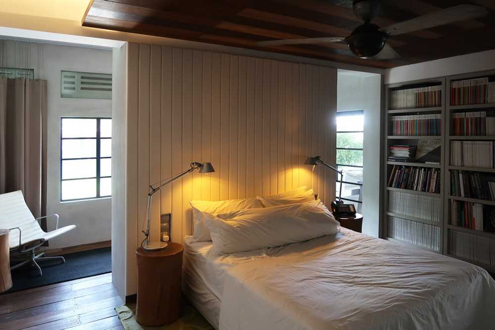 Modern Bedroom with Cove Lighting and Drop Ceiling