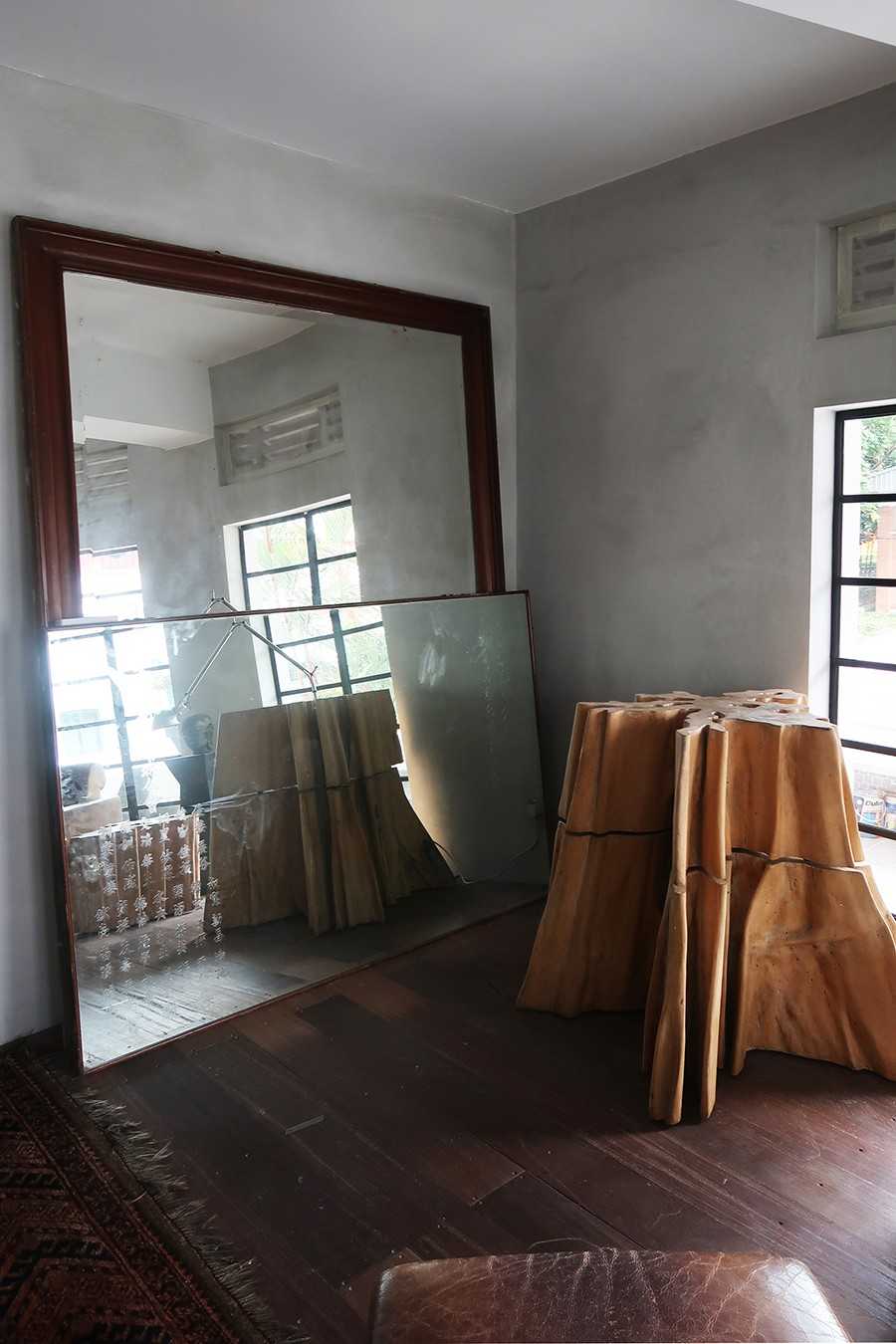 Modern Living Room with Wood Flooring and Mirror