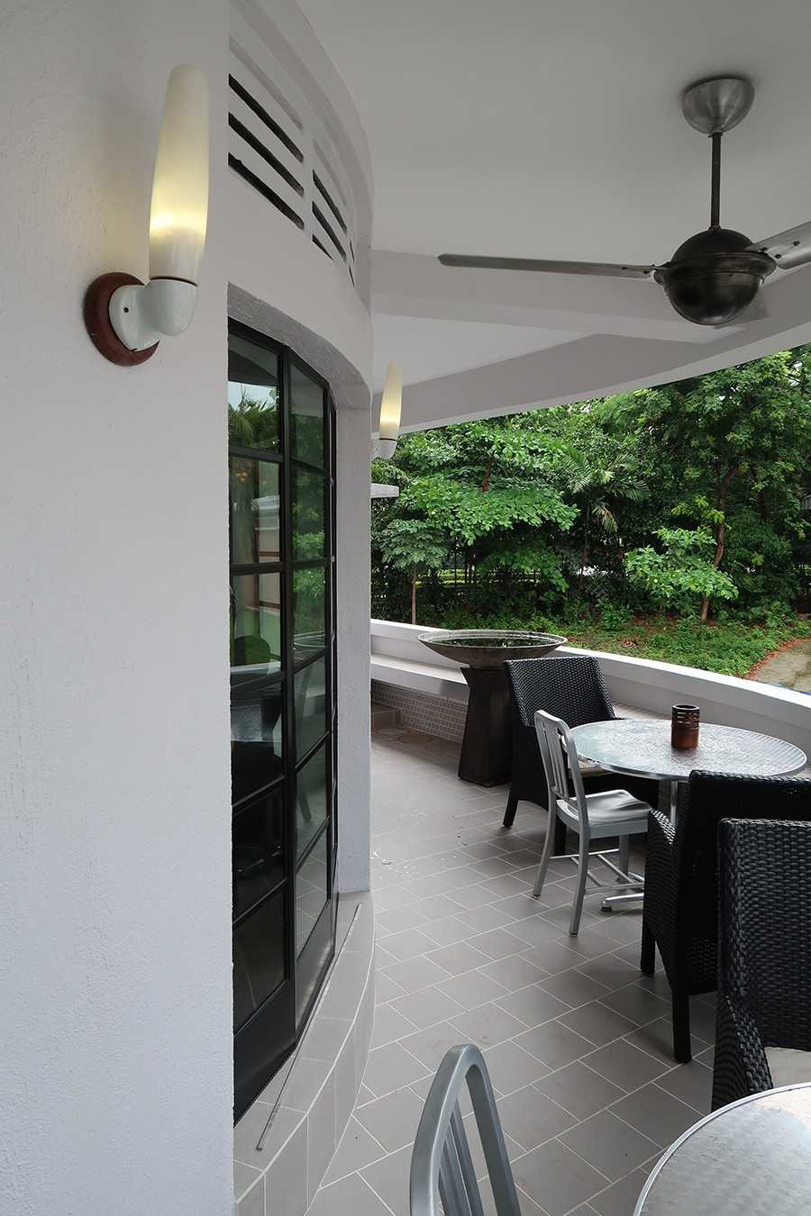 Modern Balcony with Window Grille and Outdoor Table