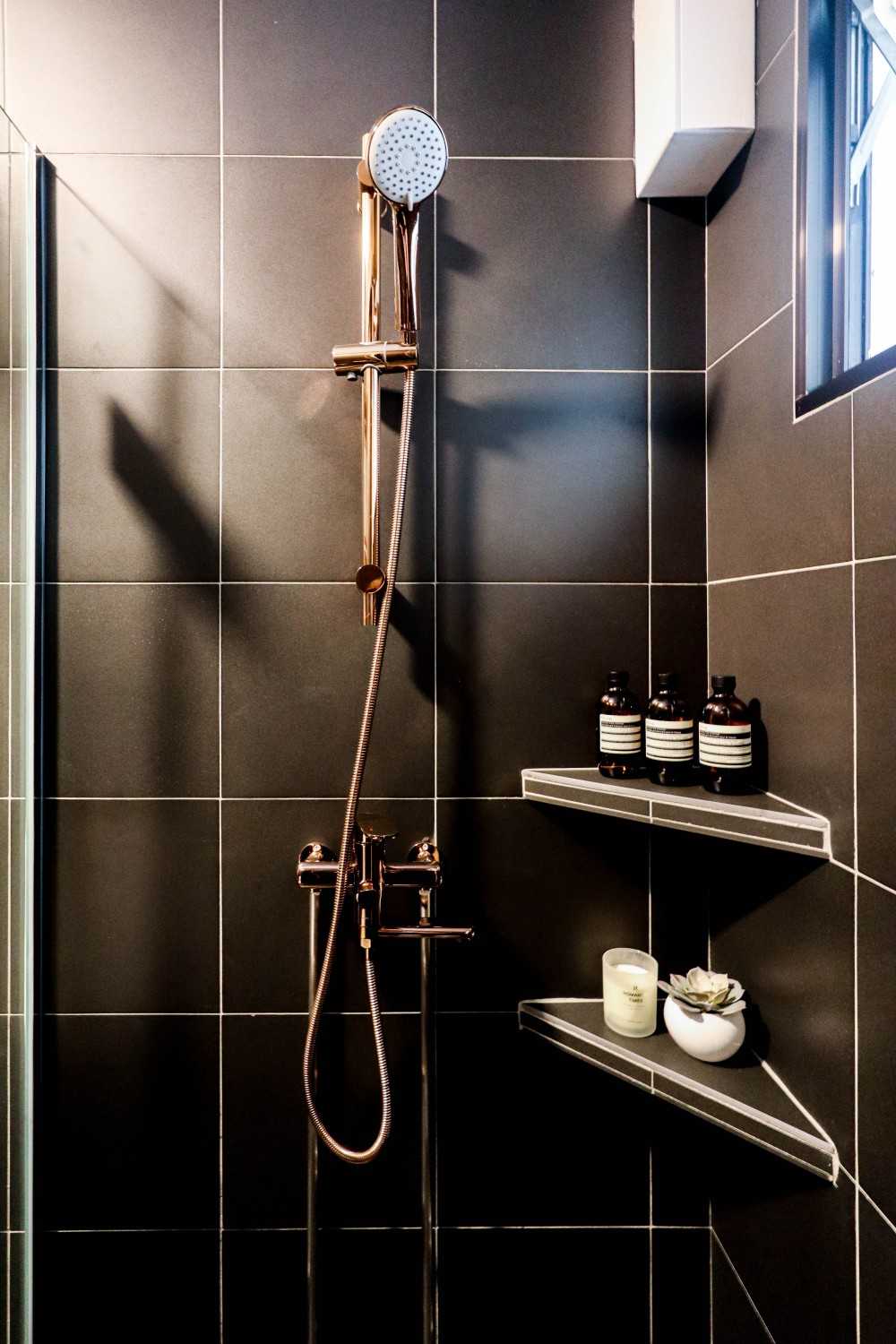 Eclectic Bathroom with Homogeneous Tiles and Shower Screen