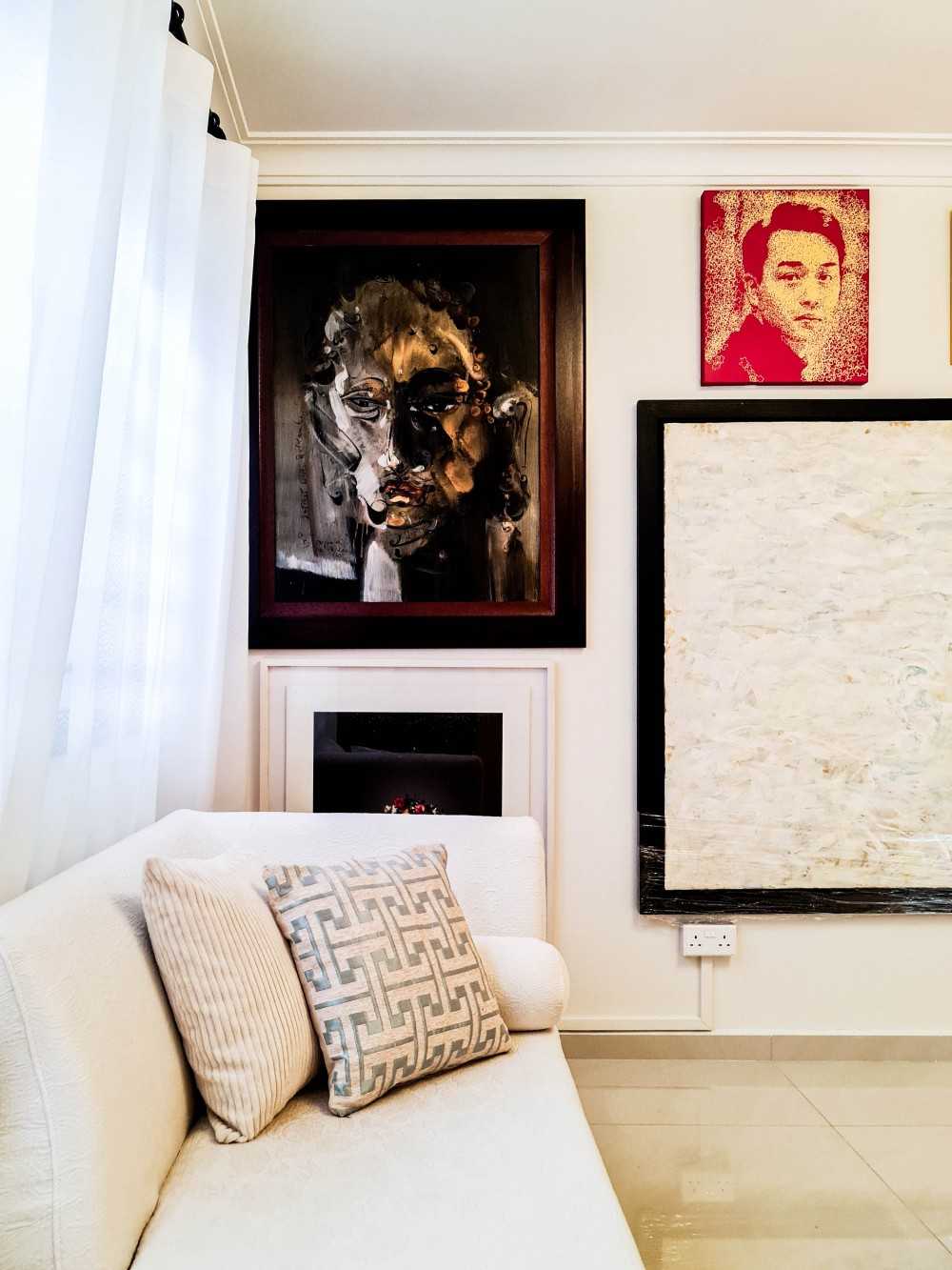 Eclectic Living Room with Artwork and Sofa