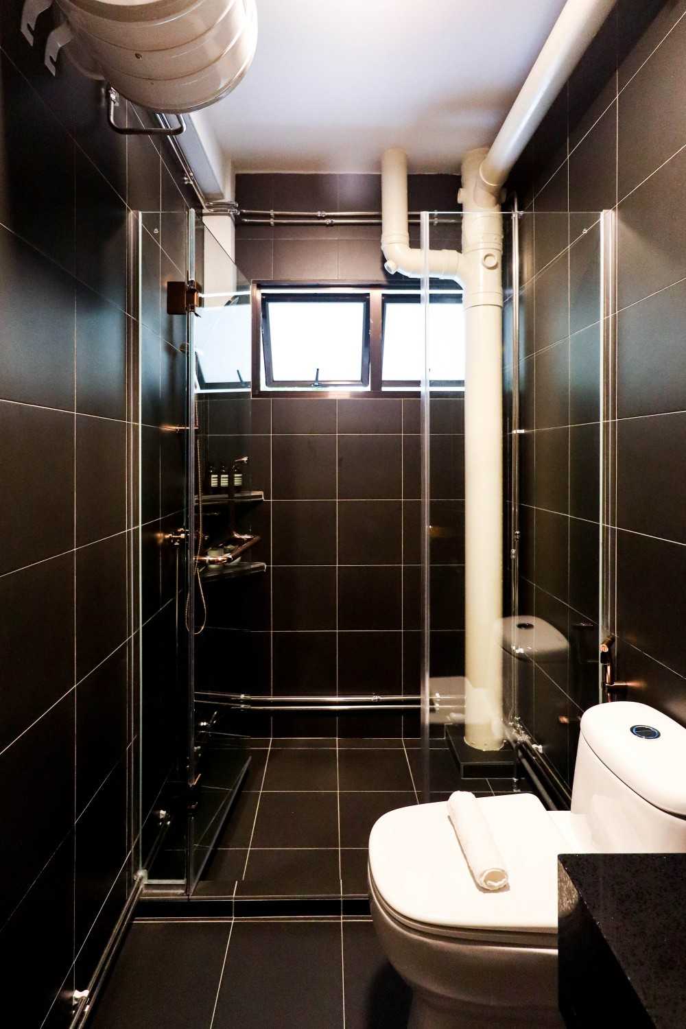 Eclectic Bathroom with Homogeneous Tiles and Shower Screen
