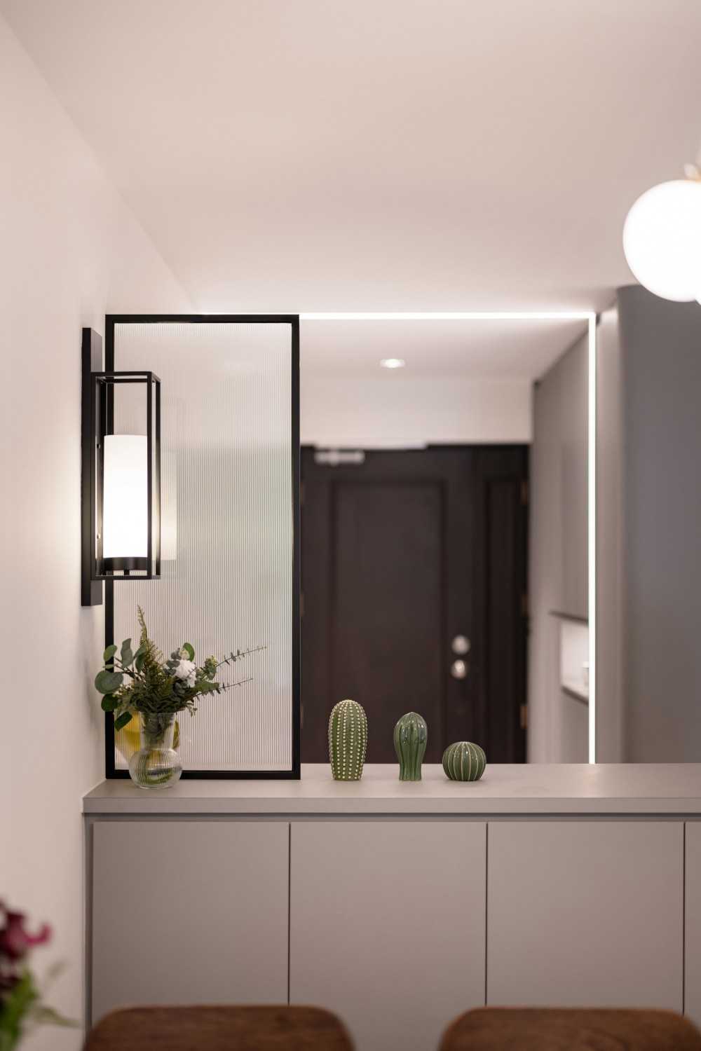 Modern Entryway with Shoe Cabinets and Lighting