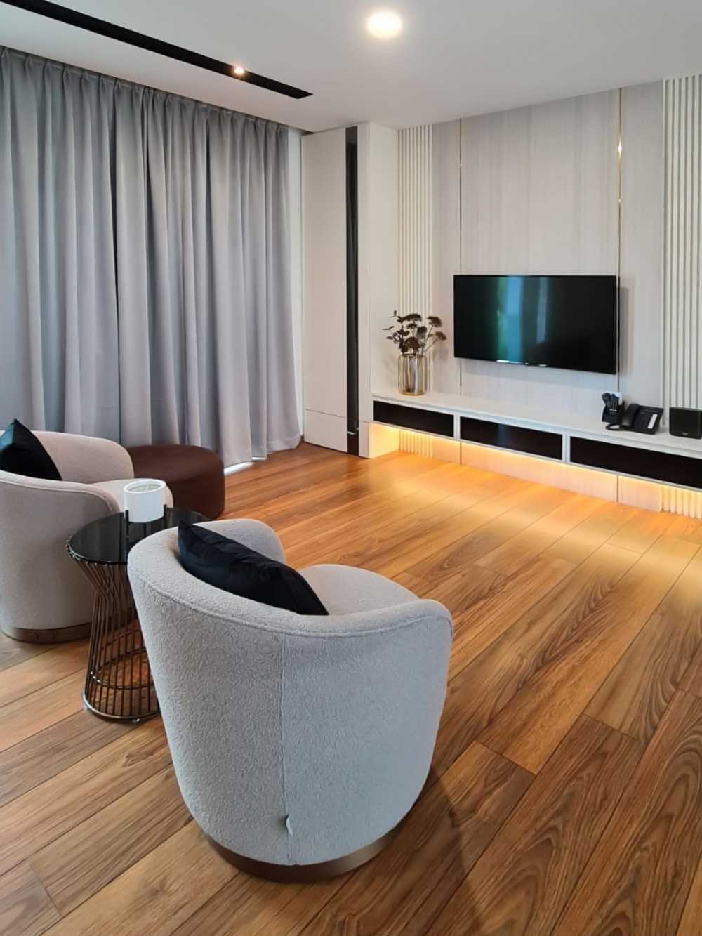 Scandinavian Living Room with Wood Flooring and TV Console