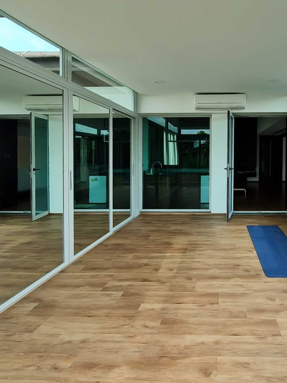 Scandinavian Home Gym with Glass Door and Window Grille