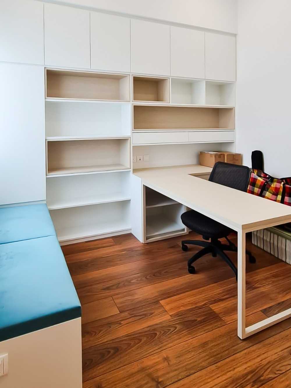 Scandinavian Study with Window Seat and Paintings