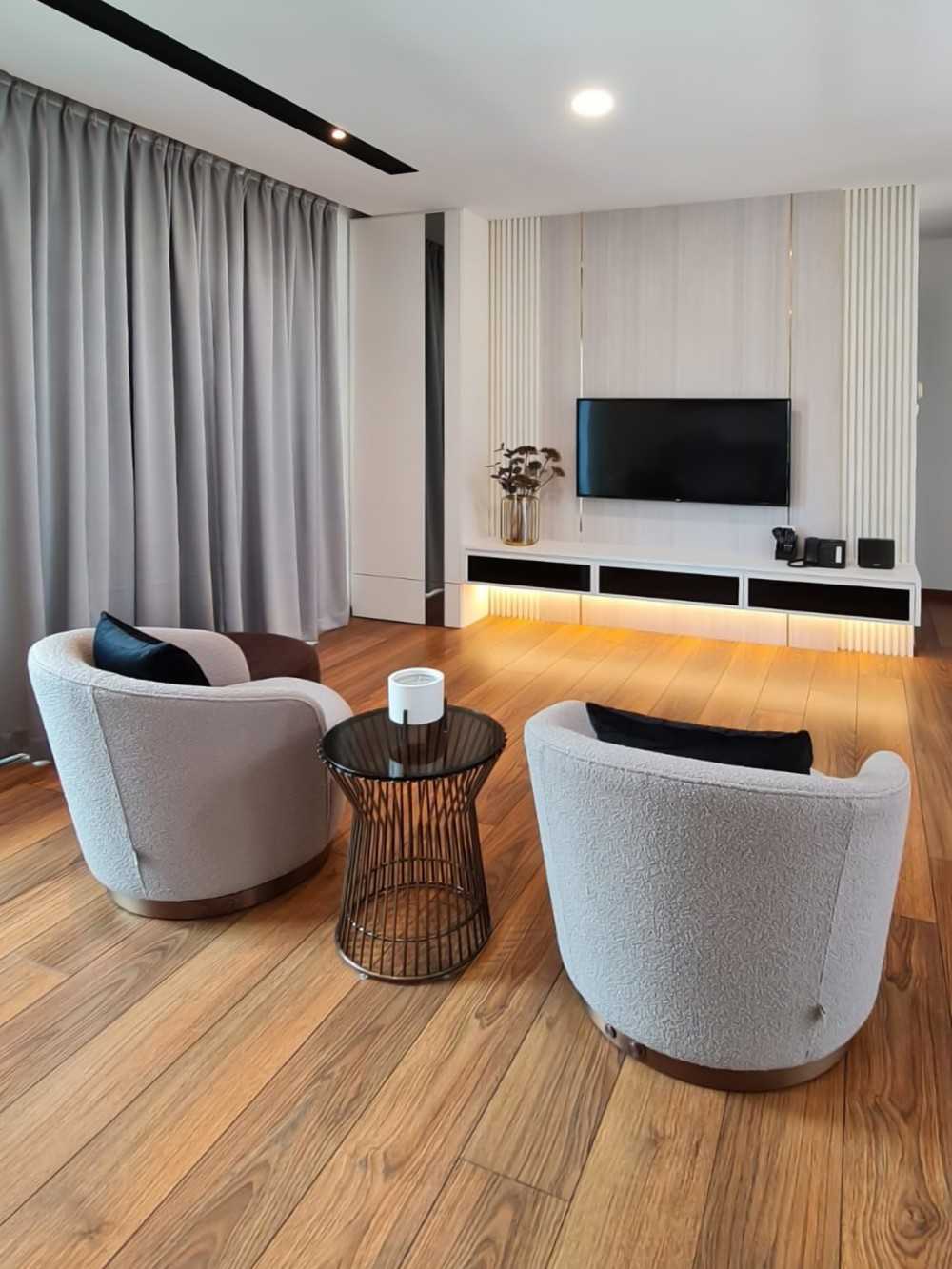 Scandinavian Living Room with Wood Flooring and TV Console