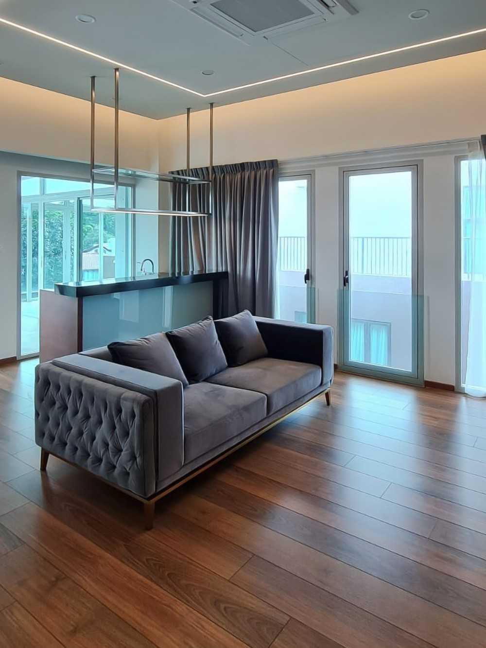 Scandinavian Living Room with Glass Door and Window Grille