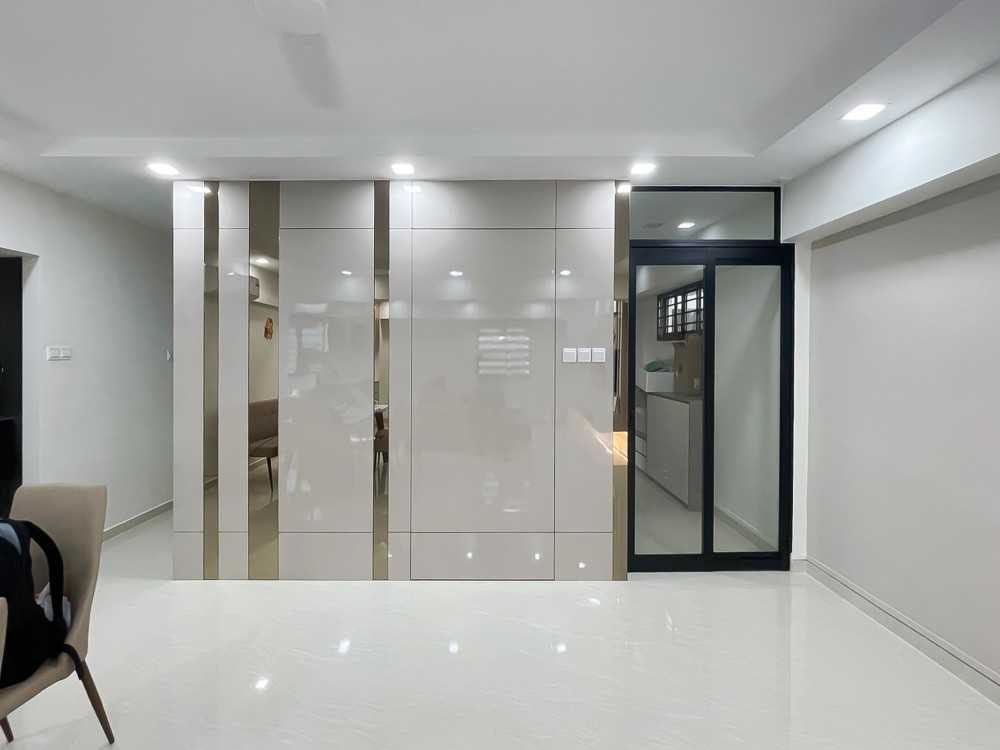Modern Foyer with Glass Door and Paintings