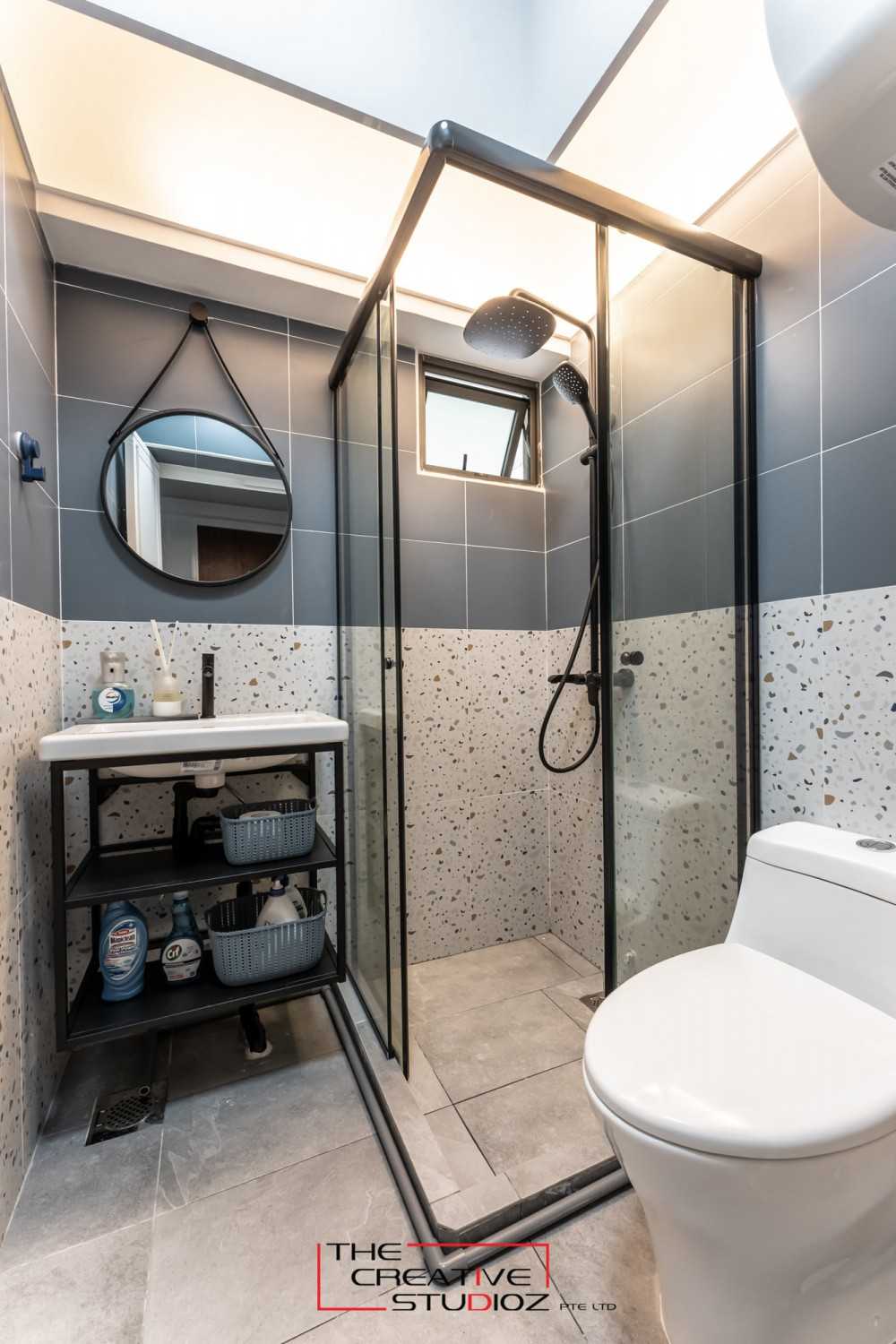 Scandinavian Bathroom with Homogeneous Tiles and Shower Screen
