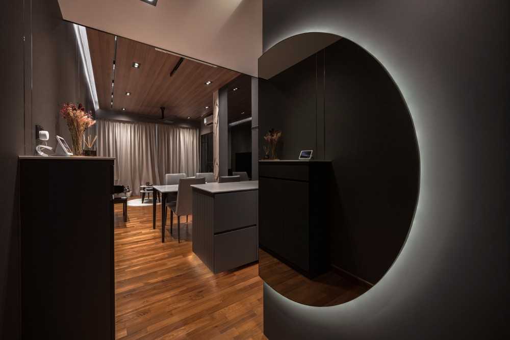 Modern Entryway with Wood Flooring and Mirror