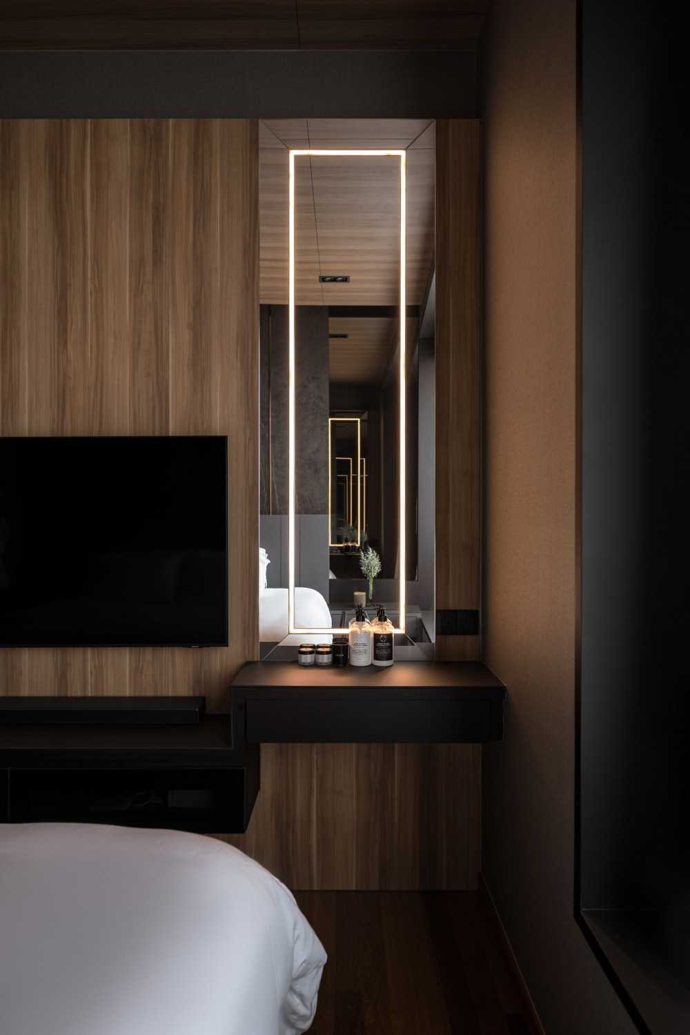 Modern Bedroom with Feature Wall and Mirror