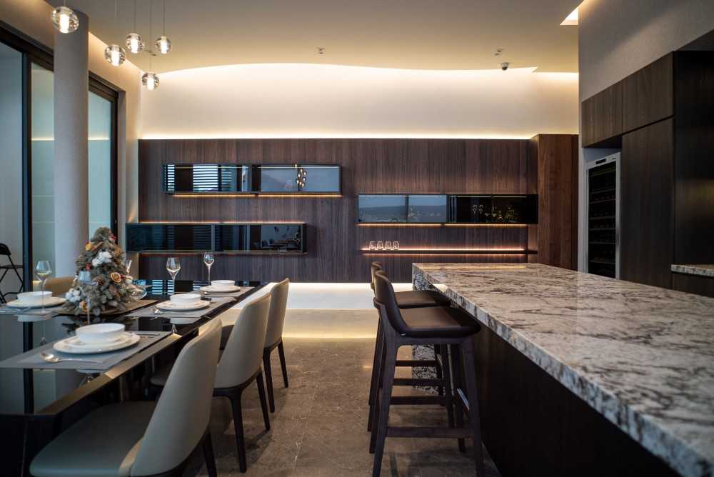 Contemporary Dining Room with Marble Floor and Bar Counter