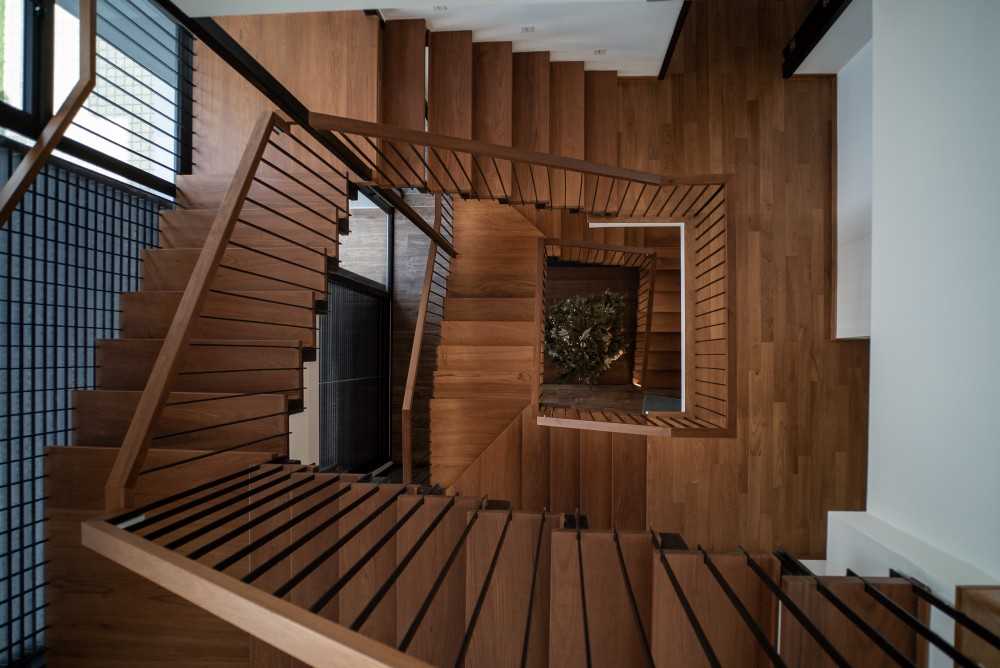 Contemporary Hallway with Staircase and Artwork