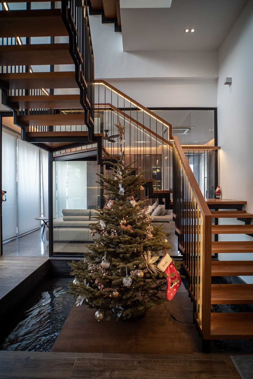 Contemporary Foyer with Wood Flooring and Staircase