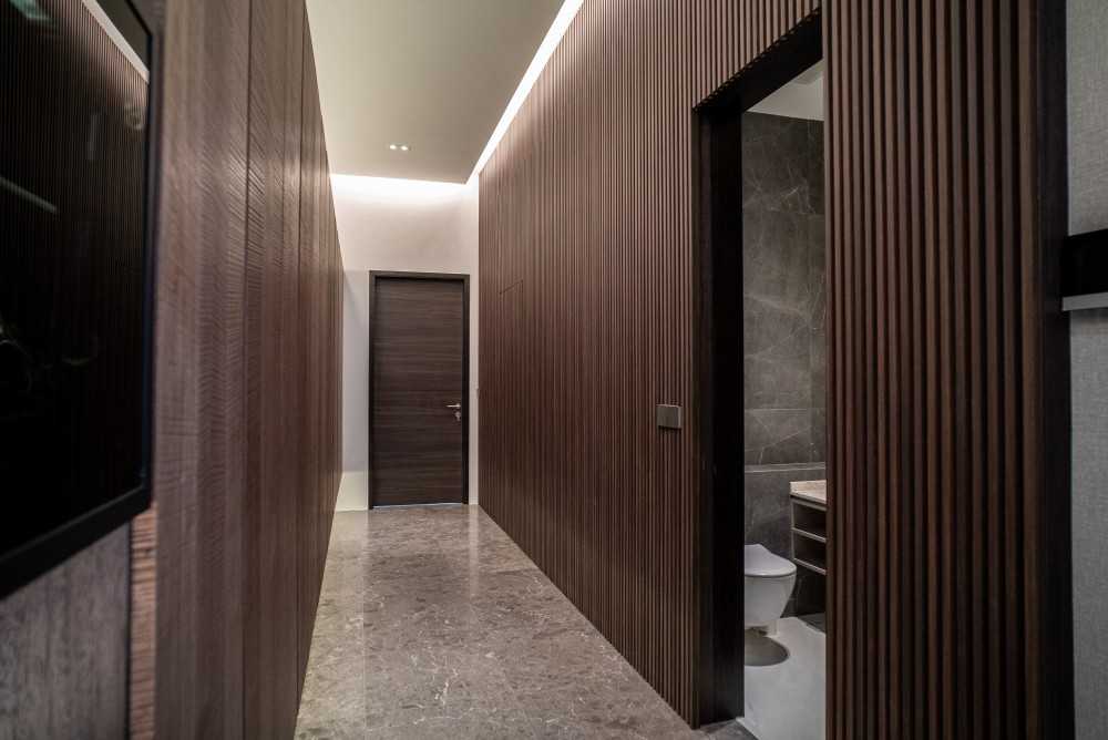 Contemporary Foyer with Marble Floor and Feature Wall