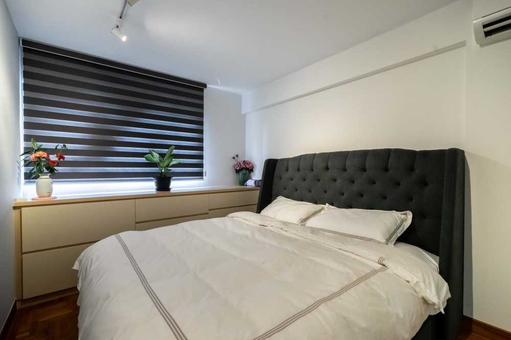 Modern Bedroom with Wood Flooring and Drop Light