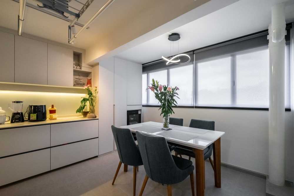 Modern Dining Room with Cove Lighting and Ceiling Light