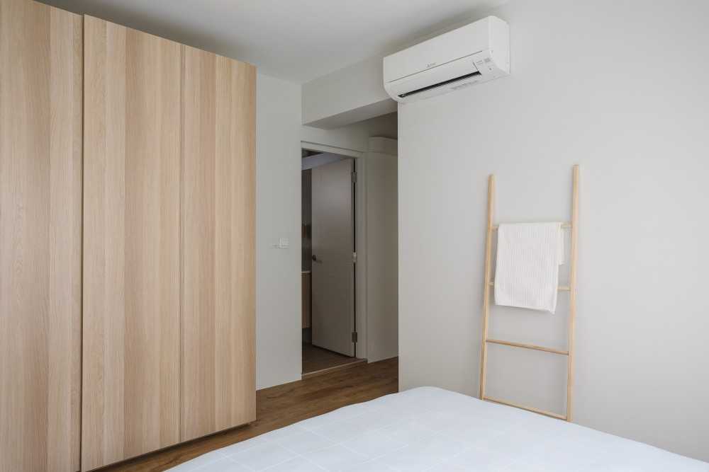 Modern Bedroom with Wood Flooring and Wardrobe